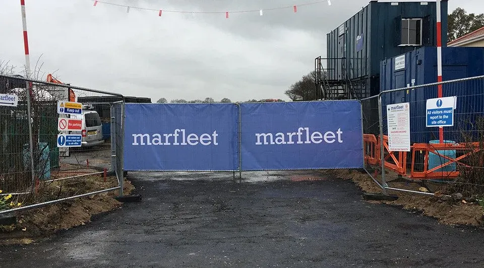 11 Reasons to use Construction Site Branding 1 Image of Marfleet using Heras gate covers for construction site branding at one of their projects