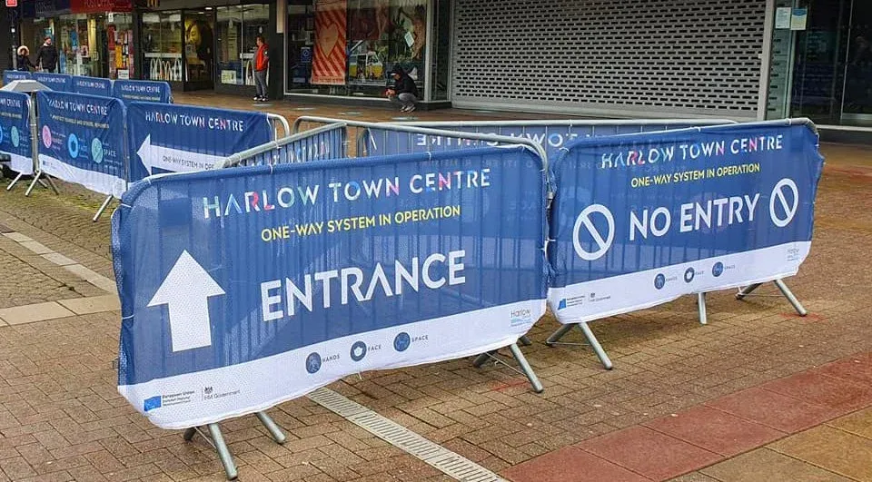 How to Manage Crowd Control: 3 Best Strategies for Safe Events 2 Premium crowd barrier covers in use to manage crowds in Harlow Town Centre