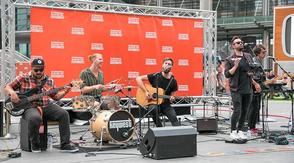 How to Organise a Festival: 10 Essential Steps for Success 5 Stage backdrop for Keywest at Busking festival